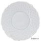 A white porcelain saucer from the Anna Weatherley Empire White Dinnerware Collection, featuring a textured lattice rim and "Saucer" inscribed at the bottom right. Crafted in Portugal from fine porcelain.