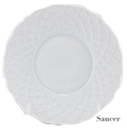A white porcelain saucer from the Anna Weatherley Empire White Dinnerware Collection, featuring a textured lattice rim and "Saucer" inscribed at the bottom right. Crafted in Portugal from fine porcelain.