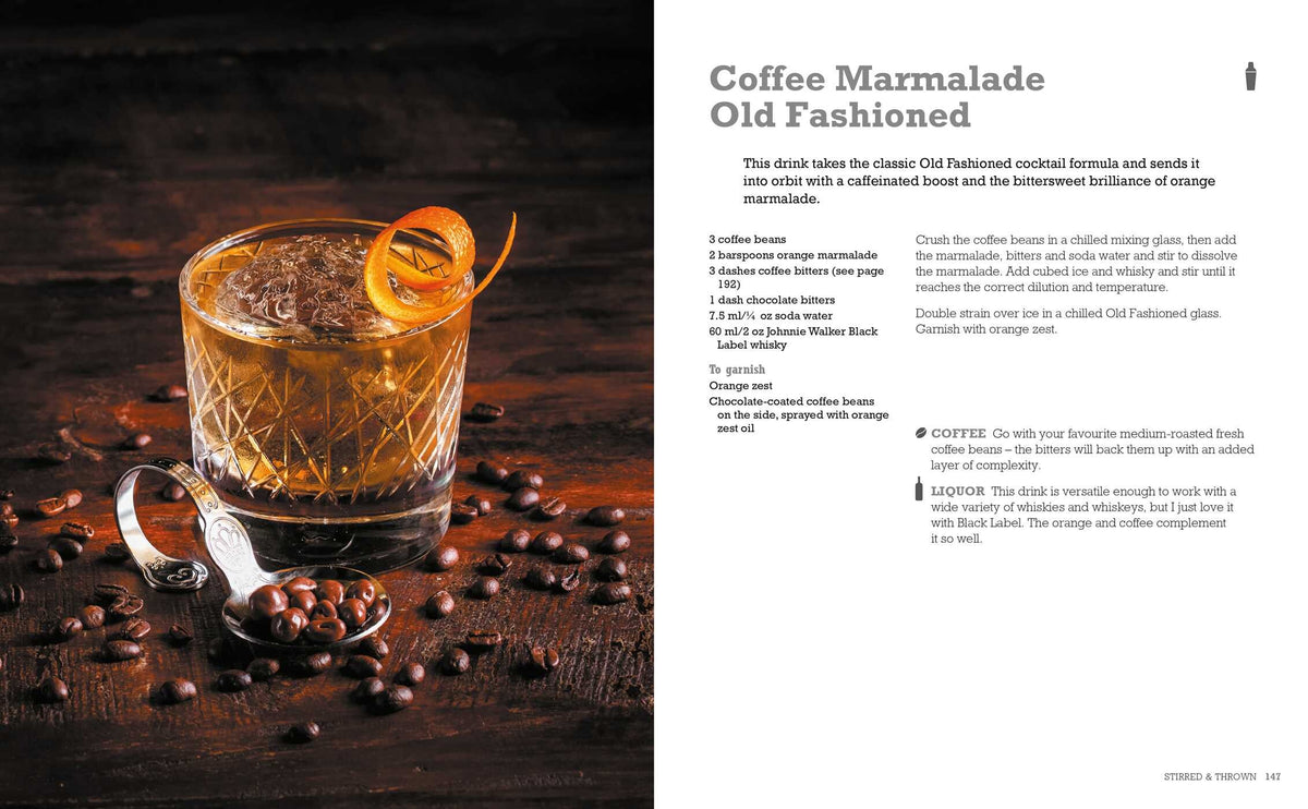 A copy of The Art & Craft of Coffee Cocktails by Simon & Schuster sits on a dark surface, flanked by an orange twist-garnished Coffee Marmalade Old Fashioned, scattered coffee beans, and a metal jigger—perfect inspiration for those eager to explore innovative cocktail recipes.