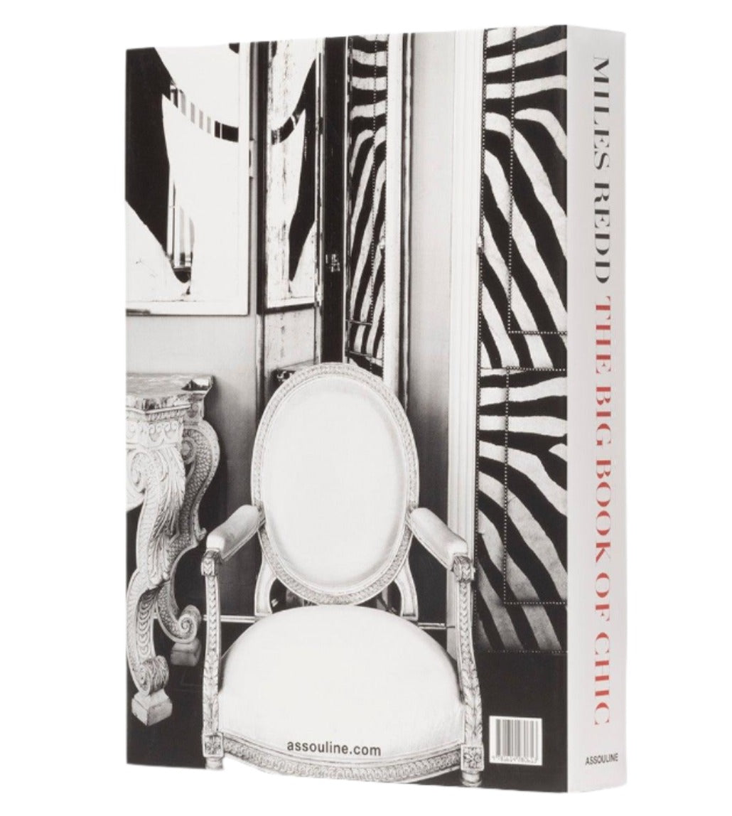 A book titled "Big Book of Chic" by Miles Redd. The cover features a black and white image of an ornate chair with zebra-patterned wallpaper in the background, epitomizing Redd's eclectic design style. The spine reads "Assouline.