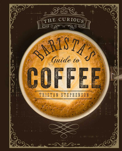 Book cover features a top-down view of a coffee cup. Text states: “Curious Barista’s Guide To Coffee, Simon & Schuster” on an earthy brown backdrop with decorative accents—a welcoming introduction to espresso drinks and essential brewing techniques for coffee lovers.