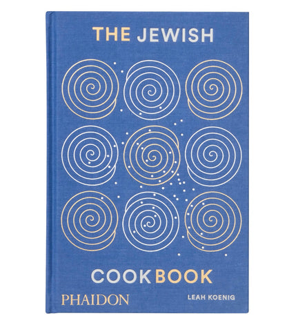 Description: "The Jewish Cookbook" by Leah Koenig, published by Phaidon, is a blue book featuring a cover design with concentric circle patterns. It showcases home-cooking recipes spanning traditional Jewish cuisine to international tastes.