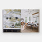 Open book unveiling a luxurious kitchen with marble backsplash, black teapots, and wine bottles on the left page, and a dining room on the right with a large table and dog showcase FREDERIC: The Last Word in Chic by Phaidon. A testament to top-tier interiors photography in chic design.