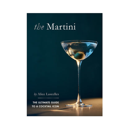Here’s a rewritten sentence using the given product data: Book cover for “The Martini” by Chronicle Books, featuring a martini glass with an olive set against a dark blue background.