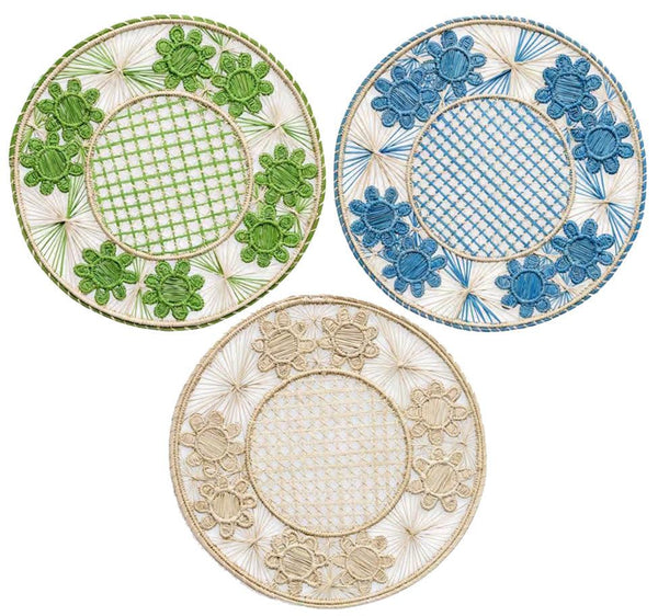 Discover the Themis Z Serenity Rattan Placemat Collection, featuring three handcrafted circular designs by artisans in Colombia. These placemats showcase floral patterns in green, blue, and beige with intricate geometric centers, adding elegance and cultural charm to your table setting.