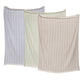 Three striped throws from the John Robshaw Lavanya Throw Collection, in pastel blue, green, and pink, are crafted from yarn-dyed cotton with a subtle herringbone weave and fringe, displayed side by side against a white background.