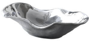 The Beatriz Ball Vento Oval Bowl, crafted from aluminum alloy, features wavy edges, a reflective smooth interior, and a matte exterior—ideal for versatile serving on any crisp white background.