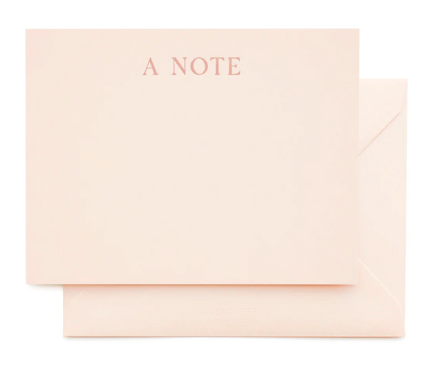 A blush pink card from the Sugar Paper Pink "A Note" Card Set sits elegantly on a corresponding envelope.