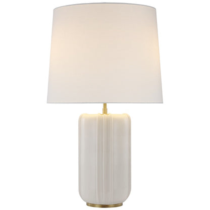 The Minx Large Table Lamp by Visual Comfort features a white ceramic base with mid-century charm, complemented by a beige fabric shade. Perfectly suited for both modern and traditional rooms, it adds a touch of elegance to any space.