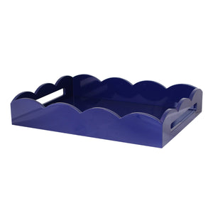 The Scalloped Navy Lacquer Tray Collection by Addison Ross features rectangular trays with a glossy finish, scalloped edges, cut-out handles on the short sides, and the Addison Ross logo.