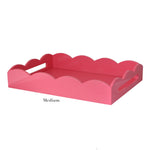 The scalloped pink tray from the Addison Ross Scalloped Watermelon Pink Lacquer Tray Collection features a high gloss lacquer finish and handle cutouts, labeled as "Medium.