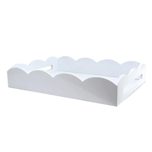 The Addison Ross Scalloped White Lacquer Tray Collection features rectangular trays with a high gloss finish, scalloped edges, and cut-out side handles, shown here against a plain white background.