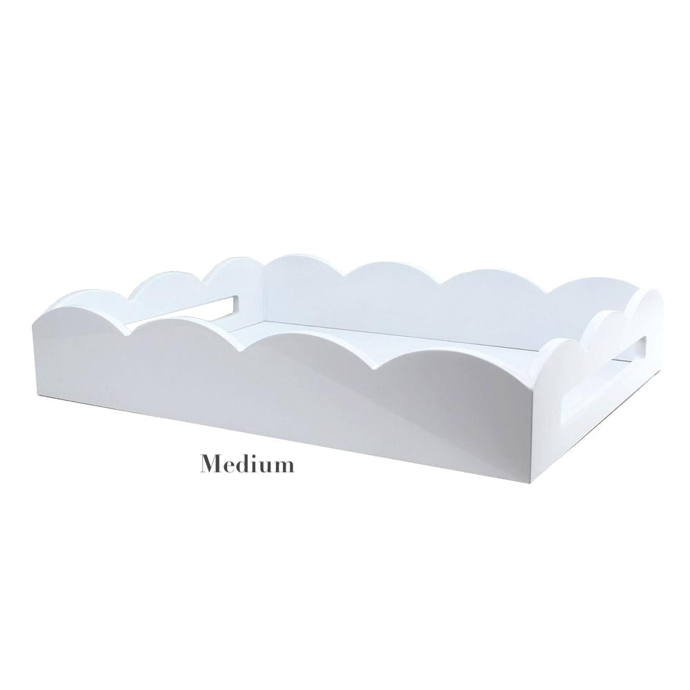 The Addison Ross Scalloped White Lacquer Tray Collection features a rectangular tray with scalloped edges, side handles, and "Medium" labeled underneath.