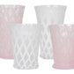 The Juliska Trellis Drinkware Collection includes four similarly sized, diamond-patterned lemonade glasses—two clear and two light pink—elegantly arranged for a stylish presentation.