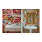Two Tropical Living bathroom vanities featuring bold floral wallpaper, marble sinks, and decorative mirrors in a tropical interior design style by Abrams.