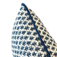 Close-up of the Burma White Indigo Outdoor Lumbar Pillow by Associated Design, showing its blue and white geometric leaf pattern with a solid blue edge, beautifully crafted and set against a white background.