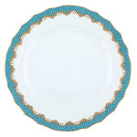 A white hand-painted porcelain plate from the Herend Fish Scale Turquoise Collection, featuring a scalloped edge and a blue and gold patterned border.