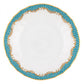 White porcelain plate from Herend's Fish Scale Turquoise Collection, featuring a scalloped edge, blue and gold patterned border, and gold rim inspired by their iconic hand-painted dinnerware.