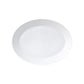 The Twist White Collection by Bernardaud features a white oval ceramic plate with a textured rim and subtle geometric pattern, inspired by Japanese design, photographed on a plain white background.