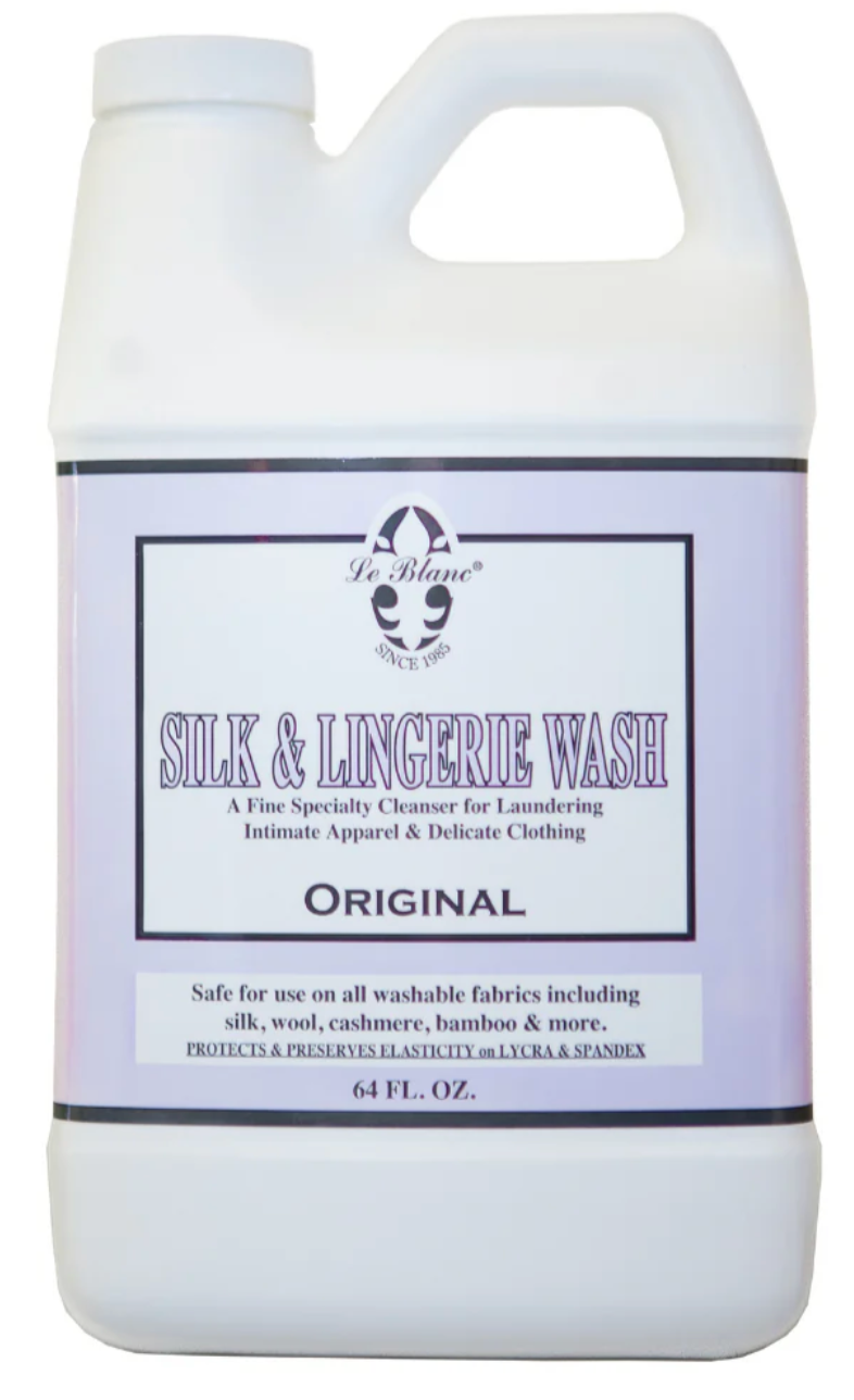 A 64 fl. oz. bottle of Le Blanc Original Silk and Lingerie Wash, a delicate fabric cleanser with a floral fresh fragrance, specially formulated for silk, wool, cashmere, and bamboo.