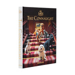 Assouline's hardcover book "The Connaught Hotel" celebrates British hospitality and features dogs on a red-carpeted staircase on its cover.