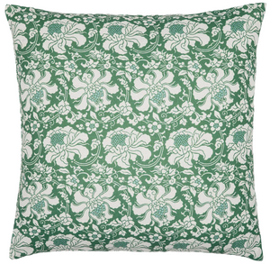 The Haasini Moss Outdoor Pillow by John Robshaw features a green background with a white floral and leaf block print. Sun resistant, it adds lasting beauty to any outdoor space.