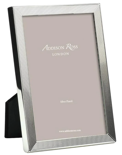 Addison Ross Grooved Silver Plated Frame Collection with ribbed edges and a brand logo of Addison Ross on a gray background.