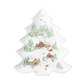 Christmas tree-shaped Berry & Thread North Pole Serveware Collection platter featuring a colorful winter village scene with snowy houses, pine trees, and reindeer.