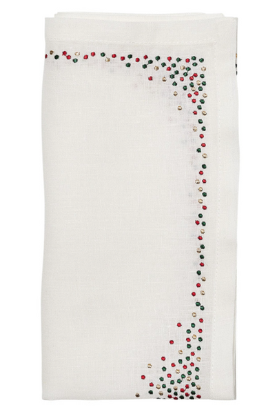 Introducing the Kim Seybert Pin Dot Holiday Napkin, a must-have for your festive table. This set of 4 pristine white cloth napkins features delicate pin dot stitching in holiday-inspired red and green along the border. They perfectly capture the spirit of celebration, adding a touch of elegance to your gatherings.