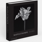 Mapplethorpe Flora: The Complete Flowers" by Phaidon is a captivating photography book featuring a black and white cover photo of a single flower, showcasing the iconic style of renowned 20th-century artist Robert Mapplethorpe.