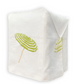 The Haute Home Beach Umbrella Bath Collection linen tissue box cover features green and yellow spiral lollipop embroidery on two sides, beautifully displayed against a white background.