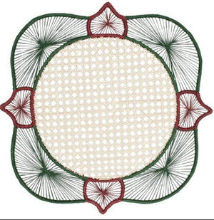 Embroidered circular doily from the Lily & Heliconia Placemat Collection by Mercedes Salazar, featuring a beige lattice center, handwoven raffia details inspired by Colombia’s artisanal heritage, green radiating thread patterns, and four maroon accents along the edges—ideal for mixing and matching with other Mercedes Salazar placemats.