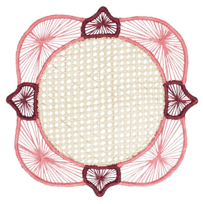 Experience the artistry of traditional Colombian craftsmanship with the Lily & Heliconia Placemat Collection by Mercedes Salazar. Each decorative round woven mat features a beige center, pink and burgundy thread accents, and a geometric border design. Skillfully handwoven from raffia, these stunning placemats showcase vibrant detail inspired by Mercedes Salazar’s signature style.