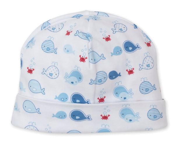 A cozy hat with whales and crabs on it. 
Product Name: Kissy Kissy Whale Watch Printed Hat
Brand Name: Kissy Kissy