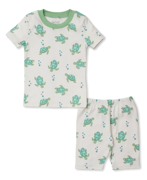 A Kissy Kissy toddler pajama set with turtles on it, made of Pima cotton.