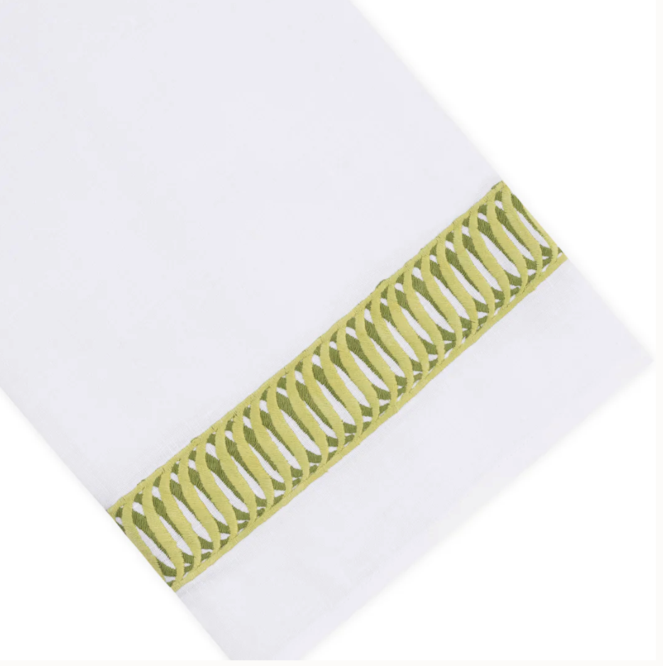 Paris Bath Accessories white Italian linen hand towel with an olive green embroidered border featuring a repeating oval pattern.