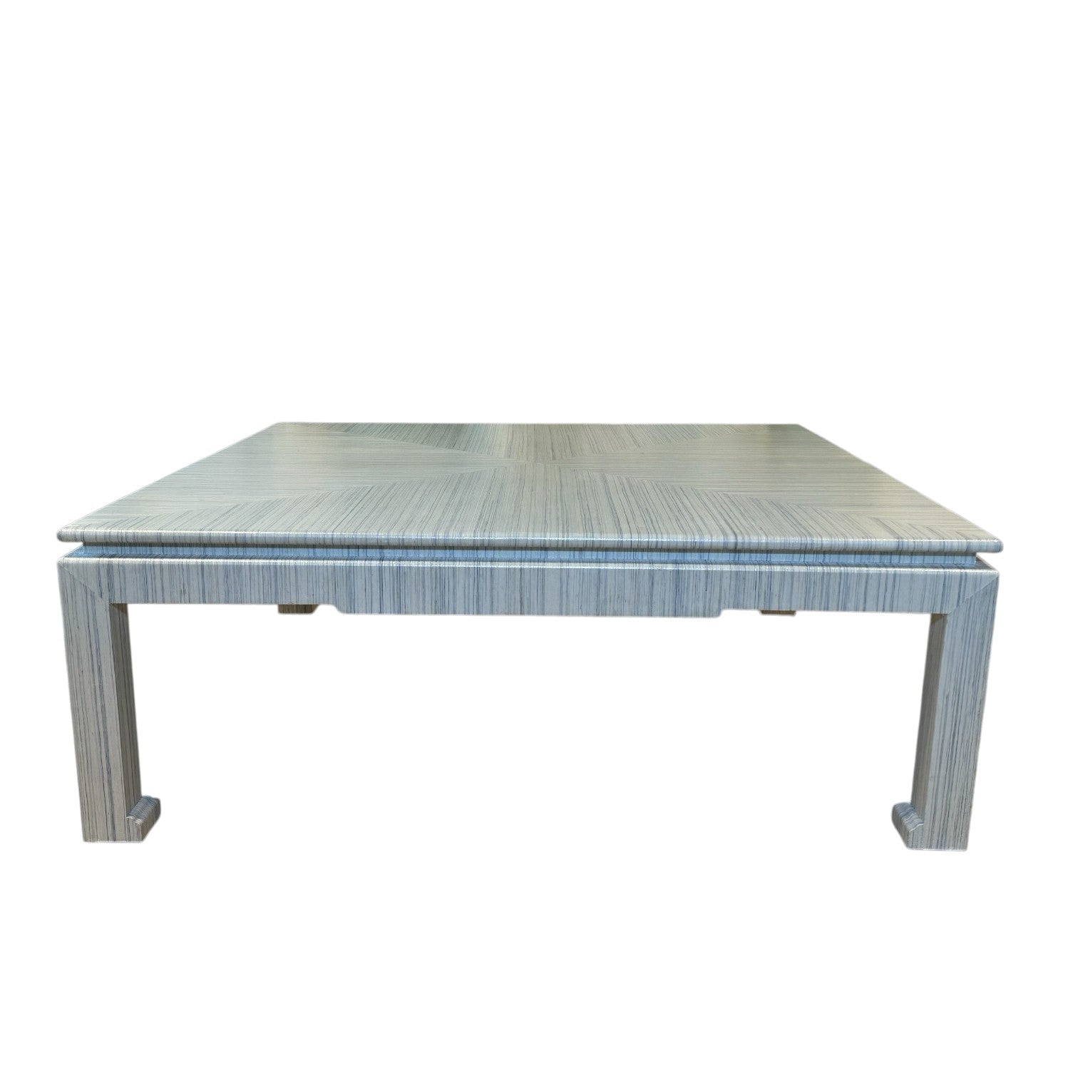 The CFW-21 Custom Cocktail Table by T3 Custom Furniture is a square, light gray table with clean lines and four straight legs, ideal for modern interiors and shown against a white background.