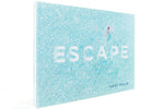 The cover of the Escape book features an aerial view of a person swimming in turquoise water.