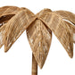 Close-up of the Made Goods Solana Floor Lamp, featuring intricately woven rattan in a palm leaf design, set against a white background.