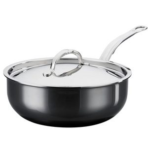 A Hestan NanoBond Titanium Essential Pan, 5qt, with a lid and long handle, metal utensil safe, is shown on a plain white background.