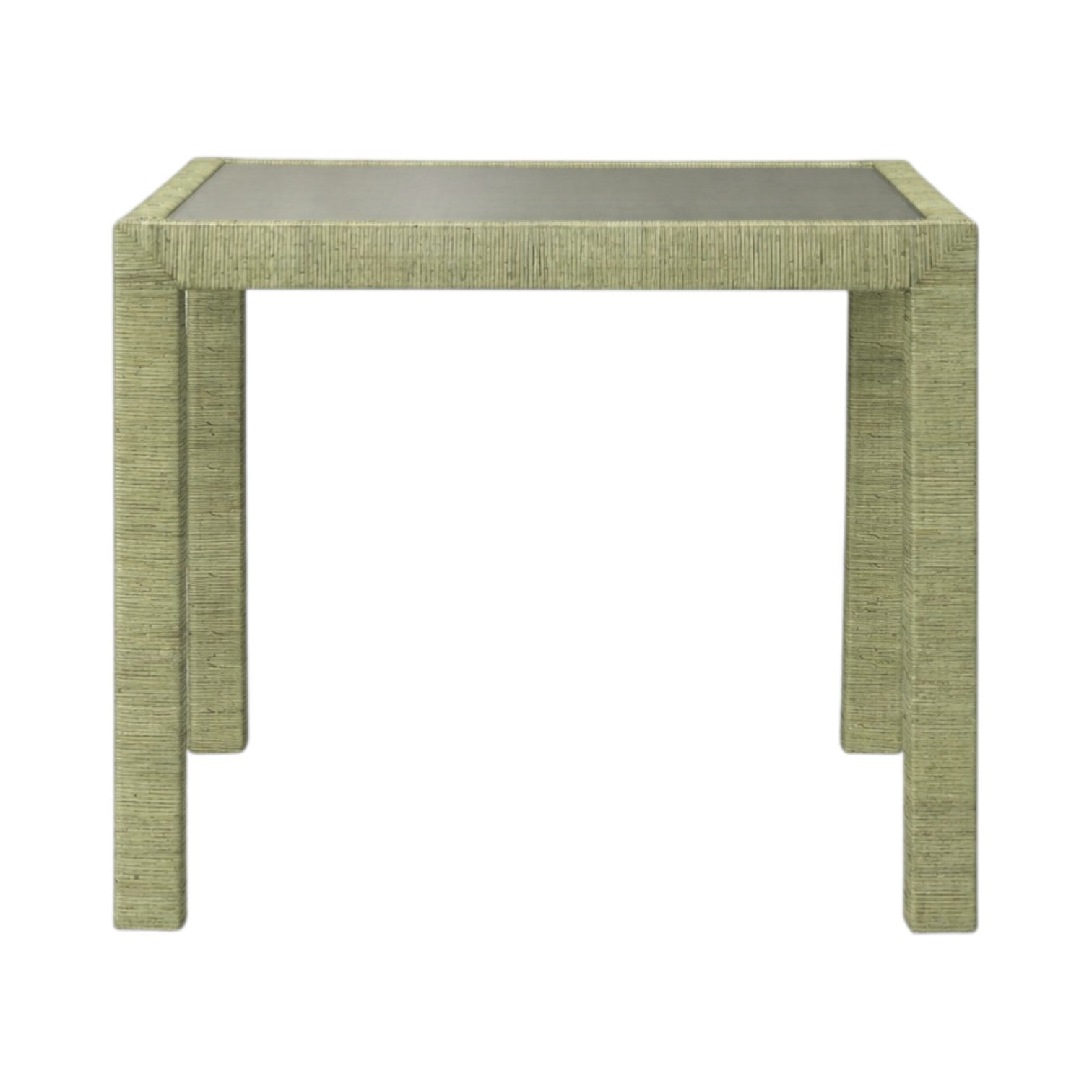 The Isla Game Table in Sage by Made Goods features a square design with a green textured finish and four straight legs, inspired by tropical rattan palms, displayed on a plain white background.