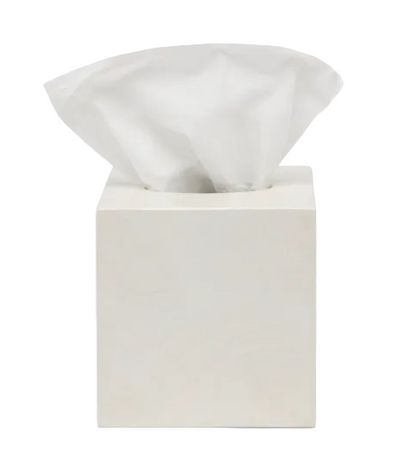 Square off-white Navagio Bath Collection tissue box cover in spiraled burl resin with a single tissue emerging from the top.