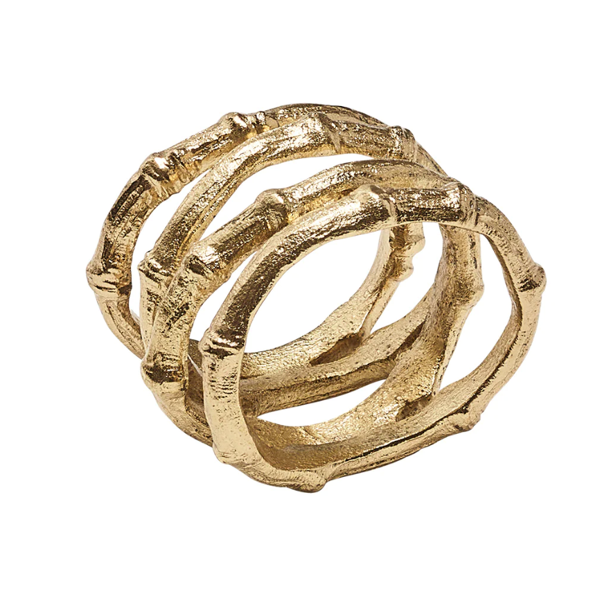 The Kim Seybert Gold Bamboo Napkin Ring features intertwined bamboo shapes and a textured, elegant gold-plated finish.