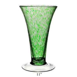 The Vanessa Vase Collection by William Yeoward Crystal features a handmade 11-inch crystal vase with a flared rim, green and white Mediterranean speckled pattern, and clear round base.