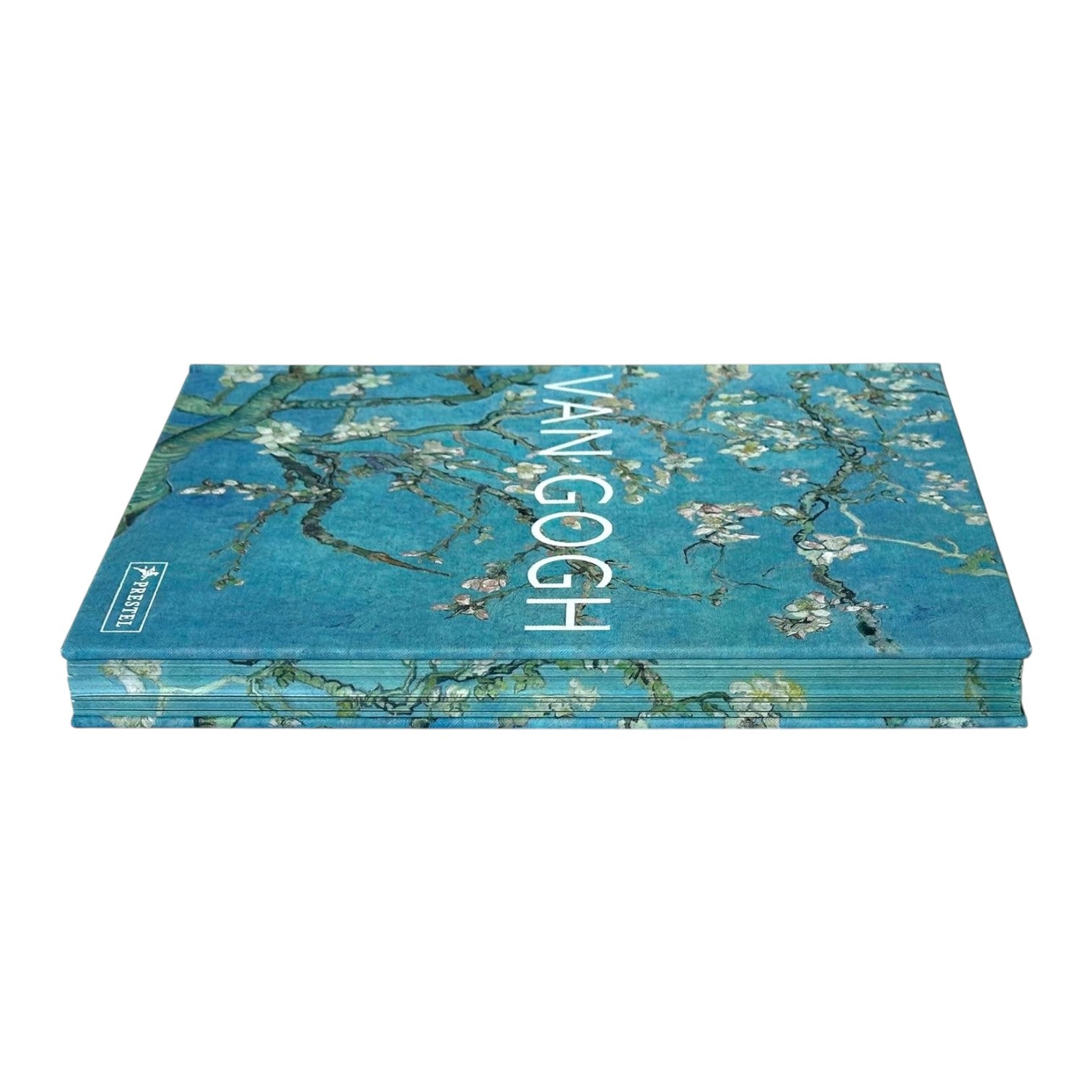 The "Van Gogh" art book by Penguin Random House lies flat, featuring a cover with a blossoming almond tree against a blue background.