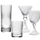 The Venetia Drinkware Collection by William Yeoward Crystal features four clear pieces—highball, lowball, martini glass with elegant stems, and goblet—with a diagonal swirl design inspired by Venetian artistry, displayed on a white background.