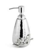 A luxury soap dispenser from the Michael Aram White Orchid Bath Collection, featuring a silver hammered metal design with a pump top and floral branch decoration near the base—perfect for complementing orchid-themed bathroom accessories.