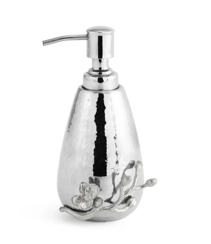 A luxury soap dispenser from the Michael Aram White Orchid Bath Collection, featuring a silver hammered metal design with a pump top and floral branch decoration near the base—perfect for complementing orchid-themed bathroom accessories.