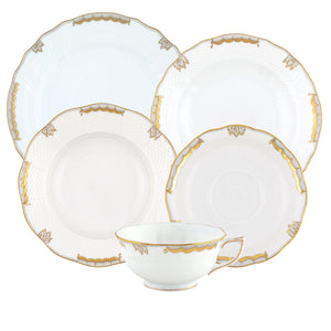 A five-piece Herend Princess Victoria Gray Collection set features four plates in different sizes and a handled teacup, crafted in white porcelain with gold trim and an elegant border.