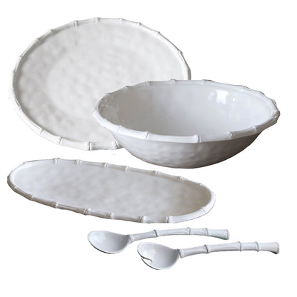 The Beatriz Ball Vida White Bamboo Serveware Collection features a large plate, bowl, oval platter, and two spoons with bamboo-like rims—versatile white ceramic pieces perfect for stylish dining.